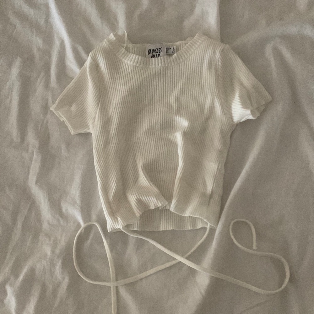 Princess polly Crop Top received it and is alittle small for me never worn by me